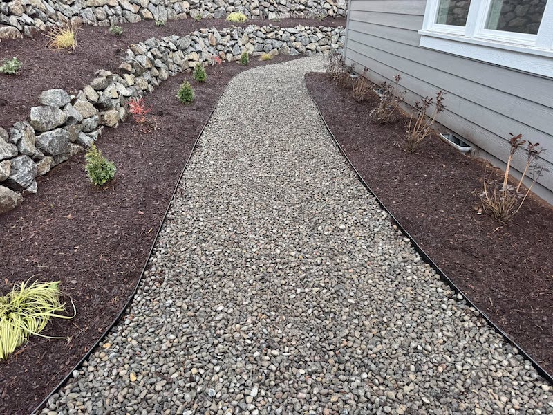 Backyard With Native Plants, Irrigation, And Retaining Walls