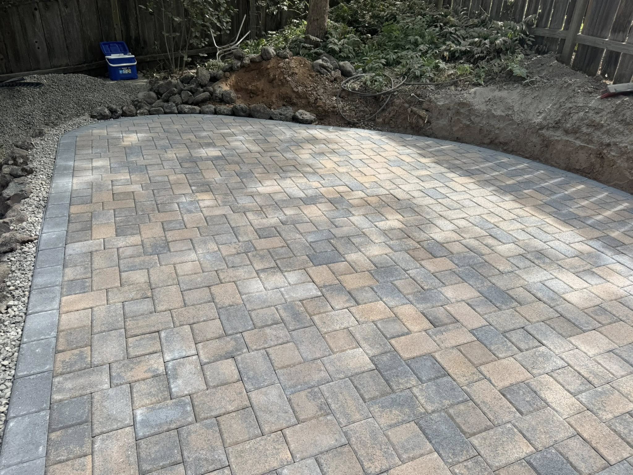 Custom paver patio in backyard